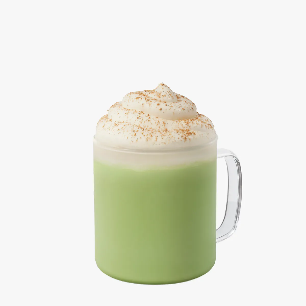 green drink in a glass mug with whipped cream and sprinkles