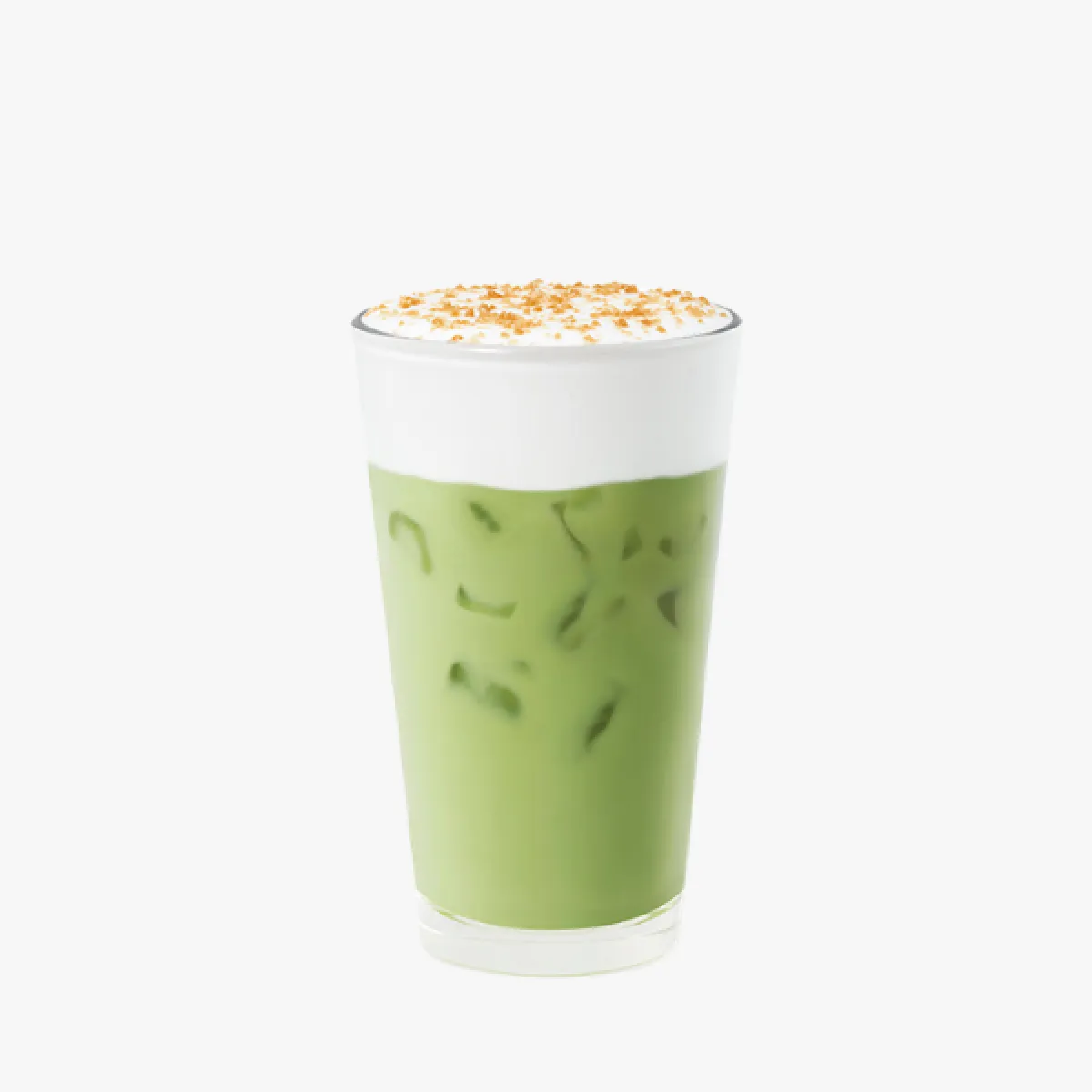 green drink in a glass mug with whipped cream and sprinkles