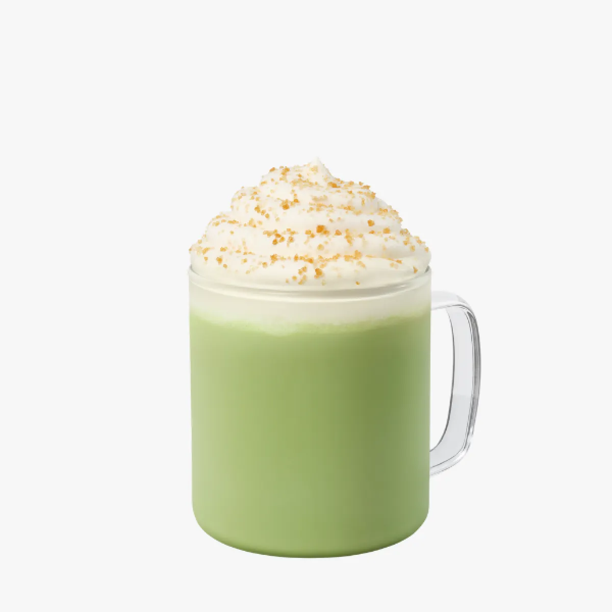 green drink in a glass mug with whipped cream and sprinkles