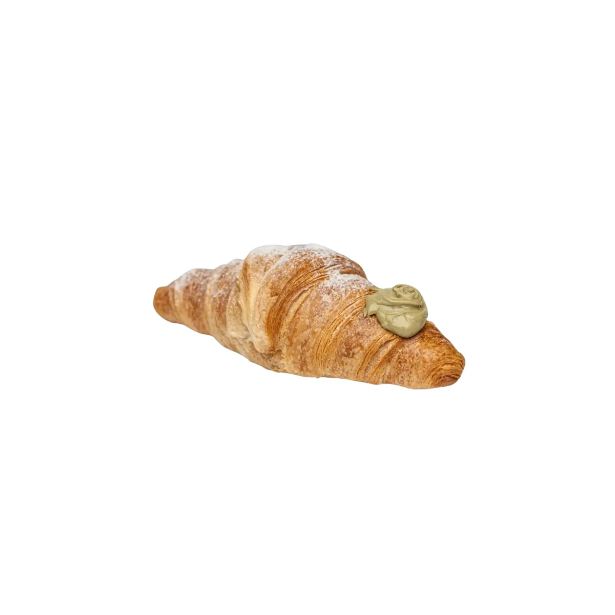Croissant posypaný práškovým cukrom, s pistáciovým krémom navrchu,