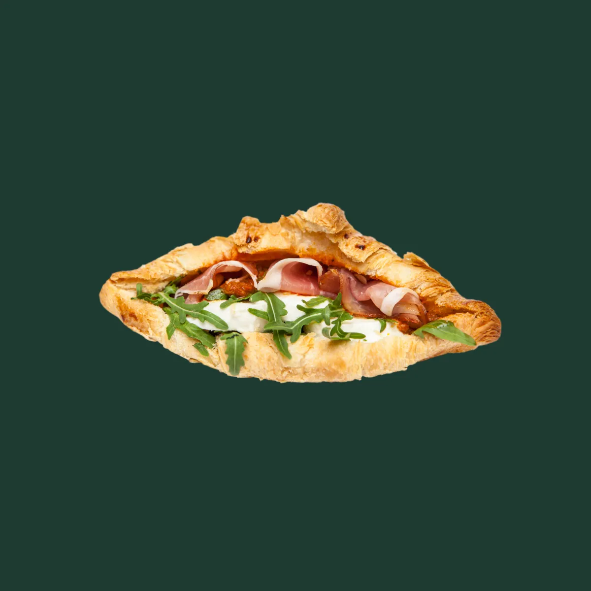 croissant filled with dry-cured Crudo ham, arugula, and mozzarella. Prepared in-store.