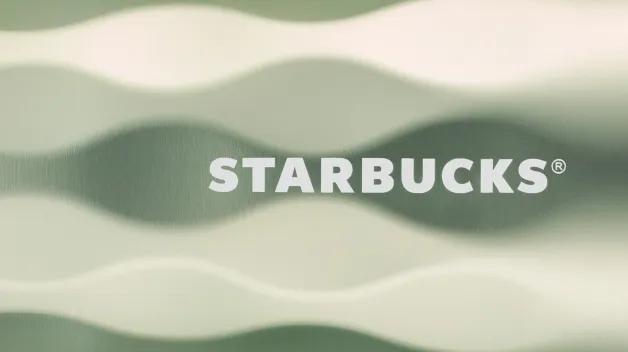svetlo zelené pozadie, jemno zvlnené, s logom starbucks
